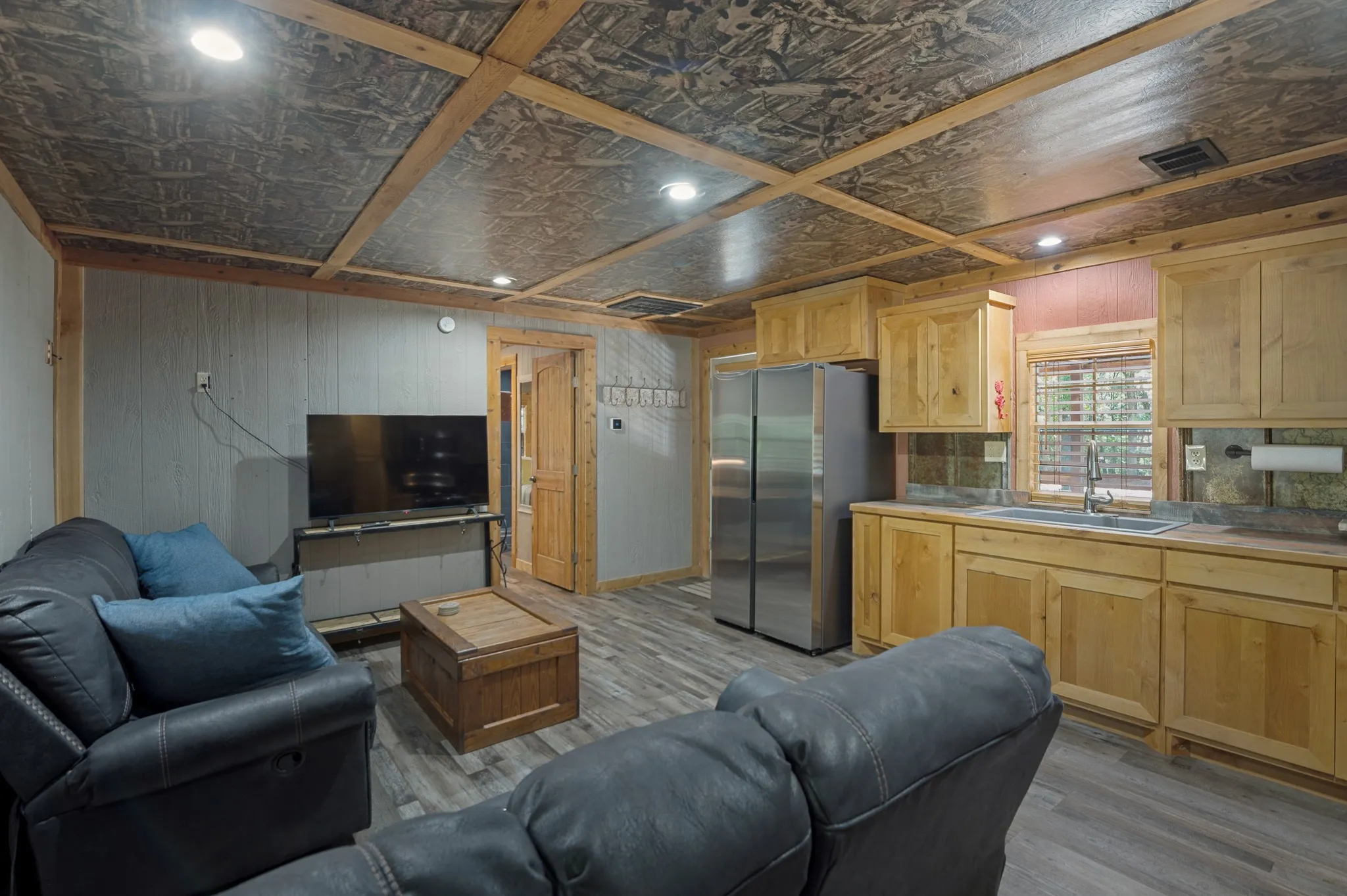 Cabin: living open to kitchen