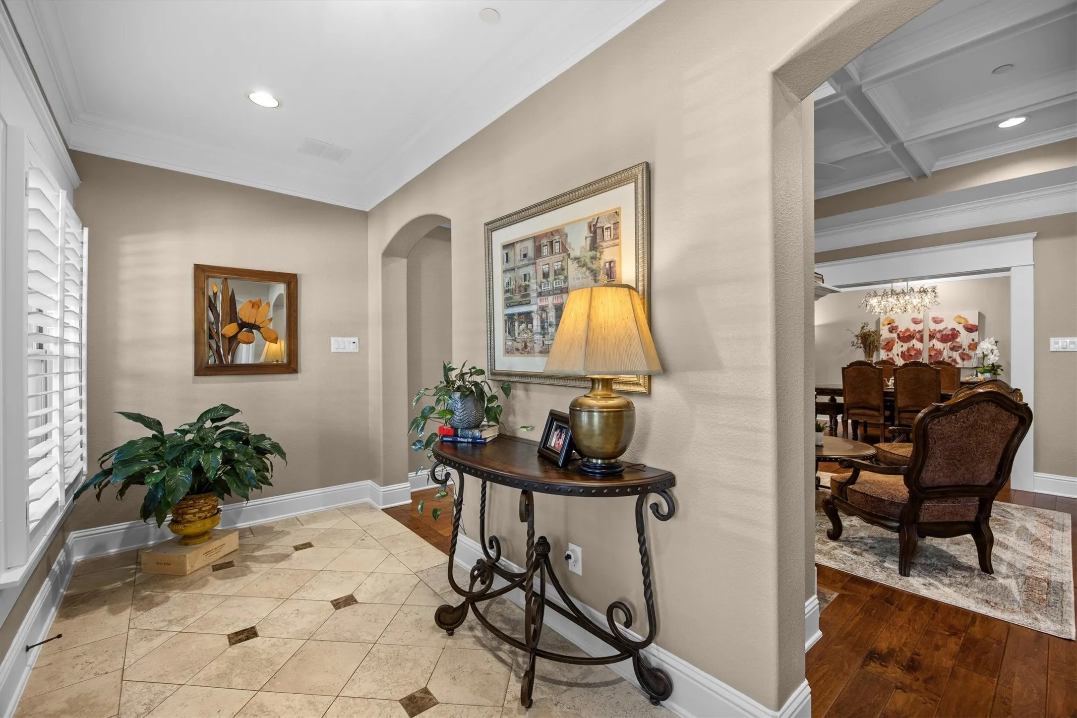 Tile flooring with diamond inlay and lots of cheerful light is the perfect "Welcome Home"!