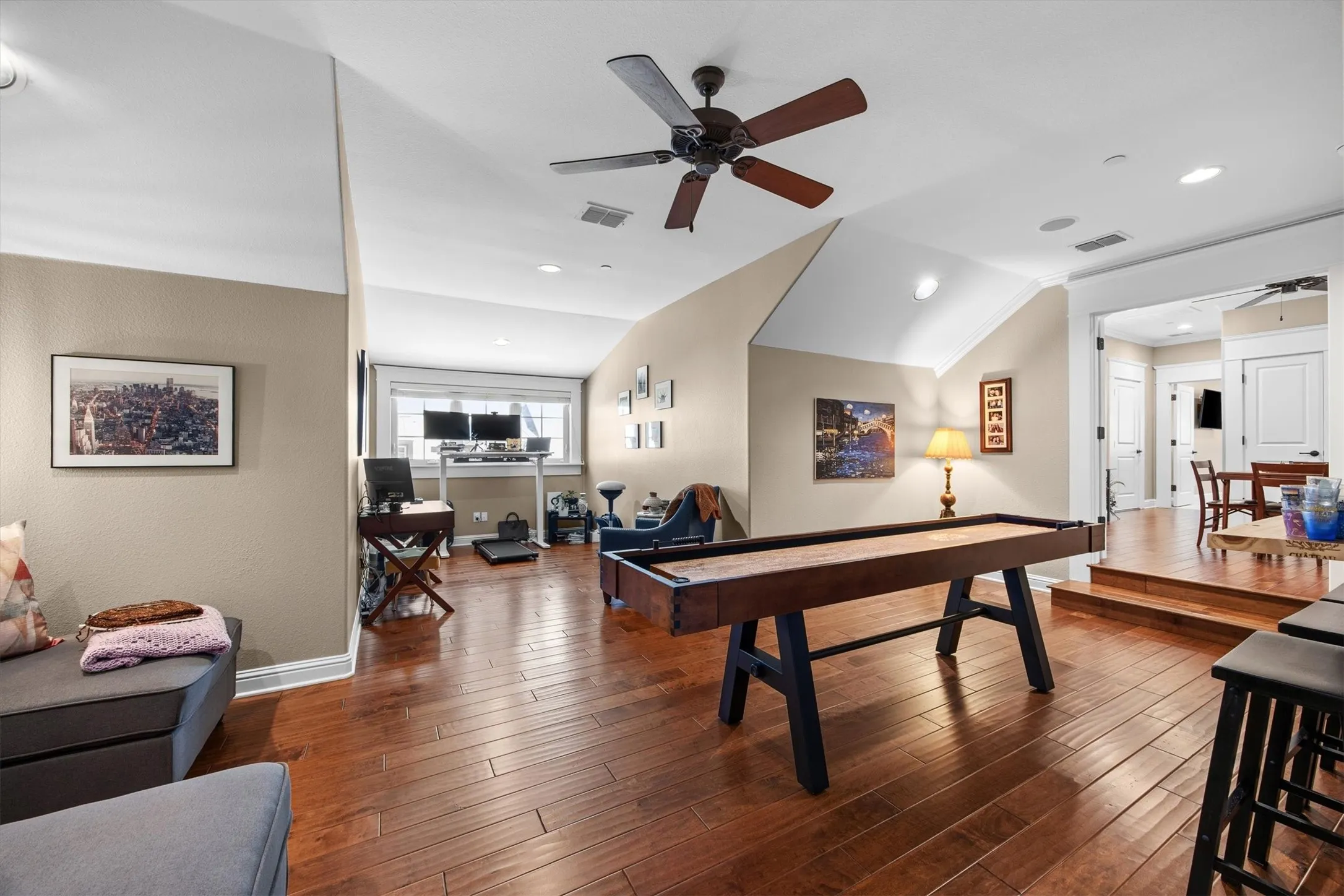 This great space is currently being used as a game room and home office and there is still space to spare!