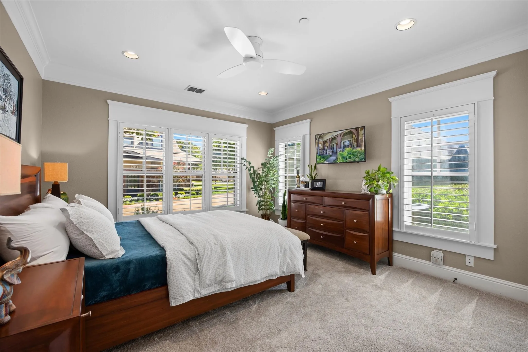 Guest bedroom also located on the main level provides the perfect space with a large closet and great proportions.