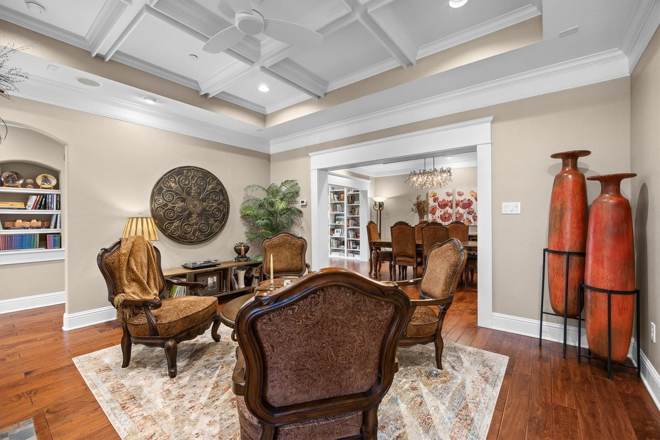 Hardwood flooring, coffered ceiling, recessed lighting, & crown molding!