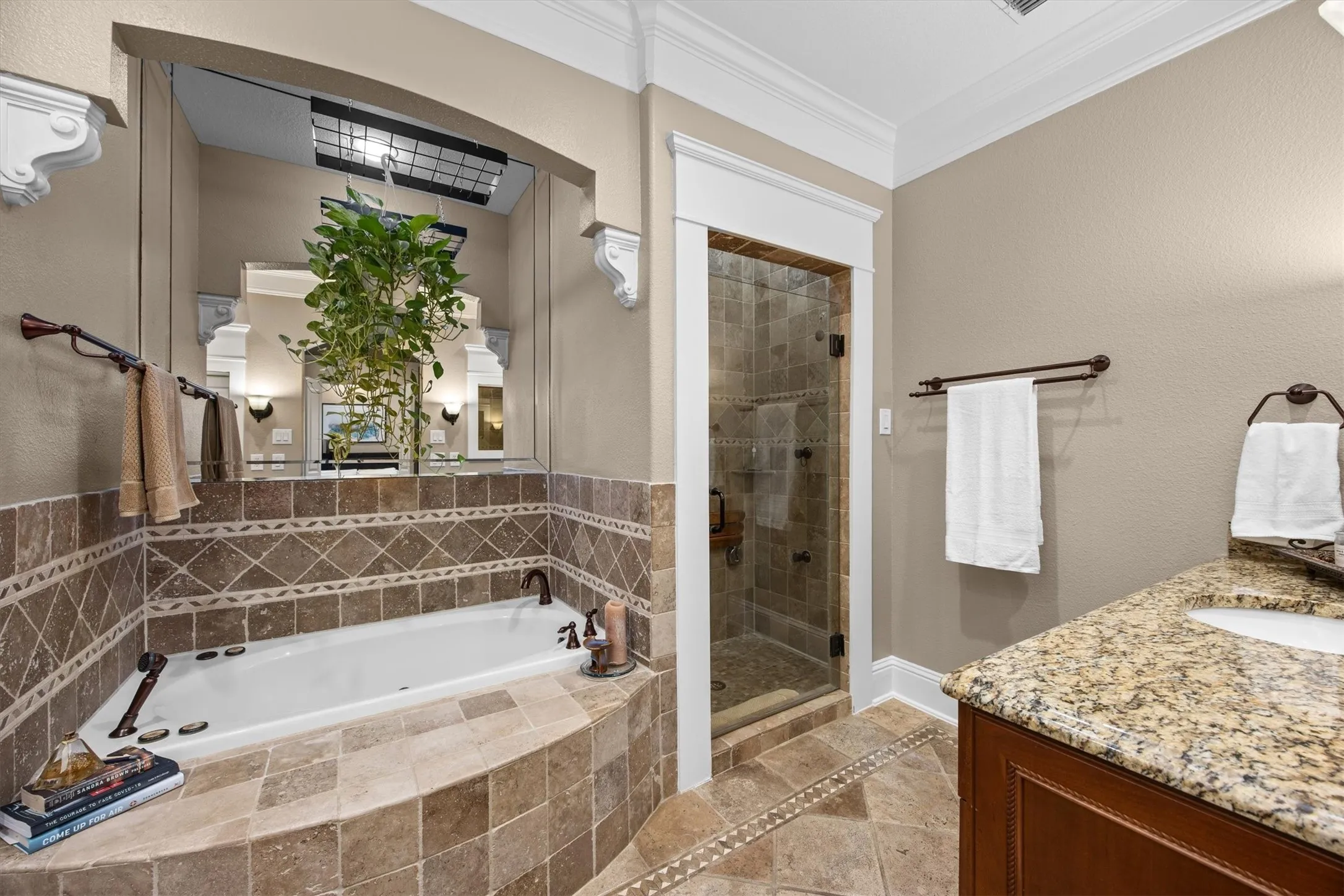 Walk in shower and large jetted tub gives you a spa like resort feel!