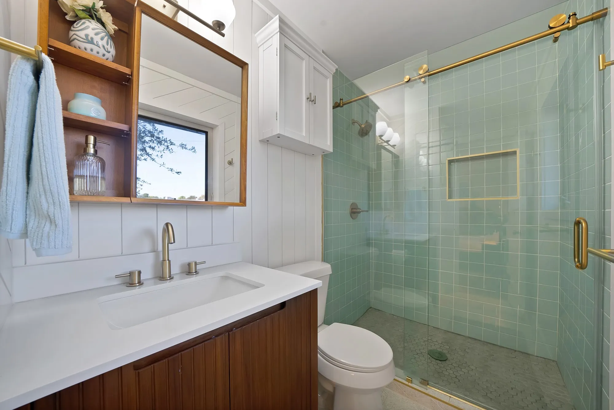 Full bathroom featuring vanity and a stall shower