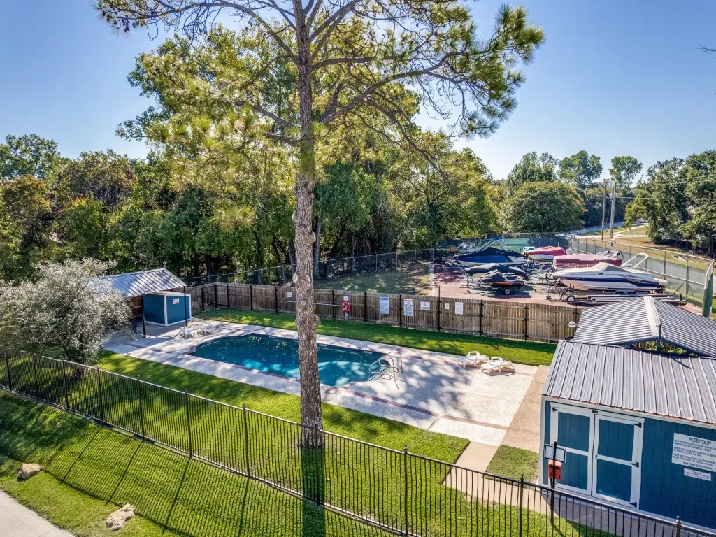 Community Pool, and additional fenced area for boat storage