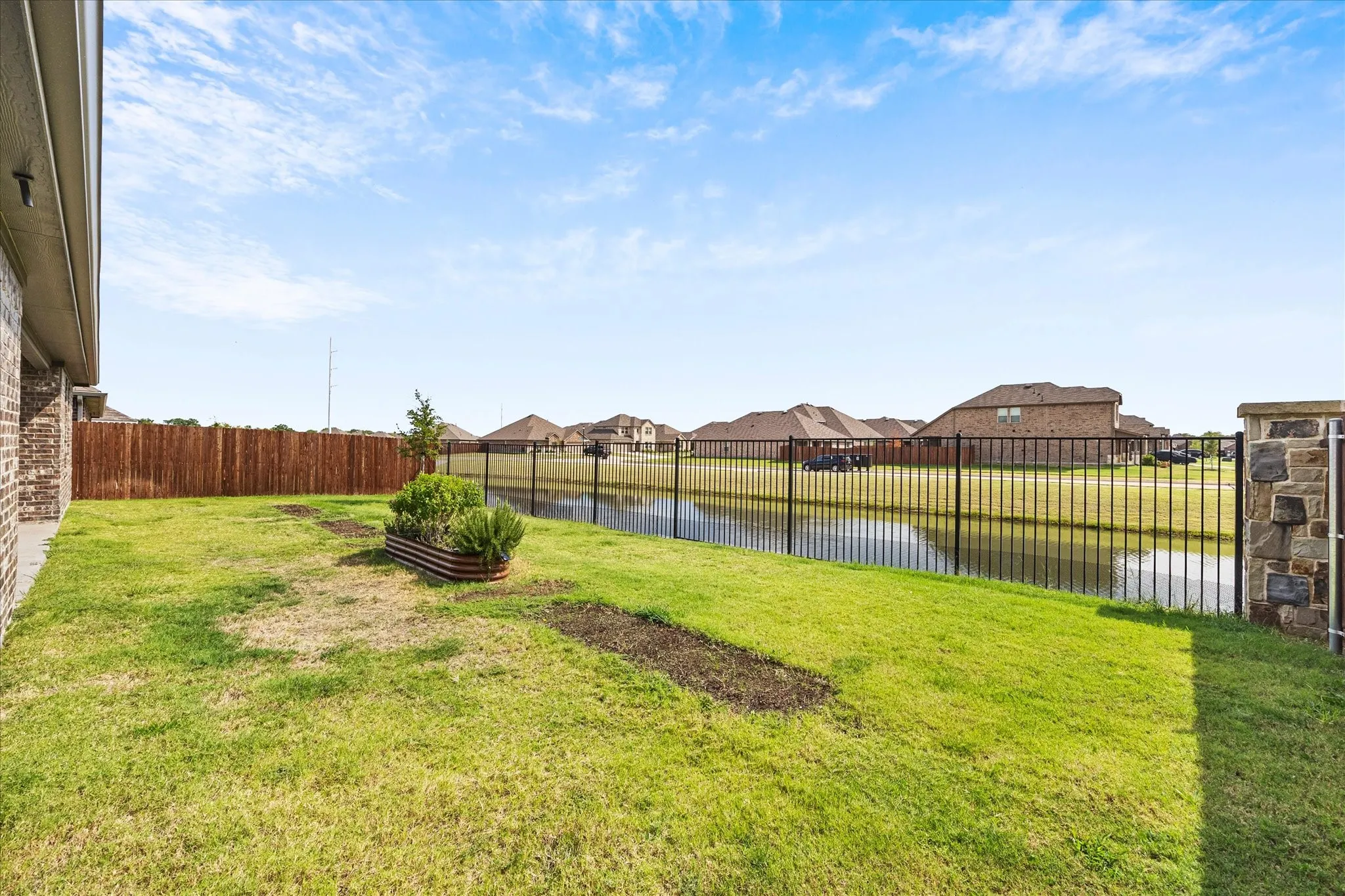 Private backyard overlooking community canal