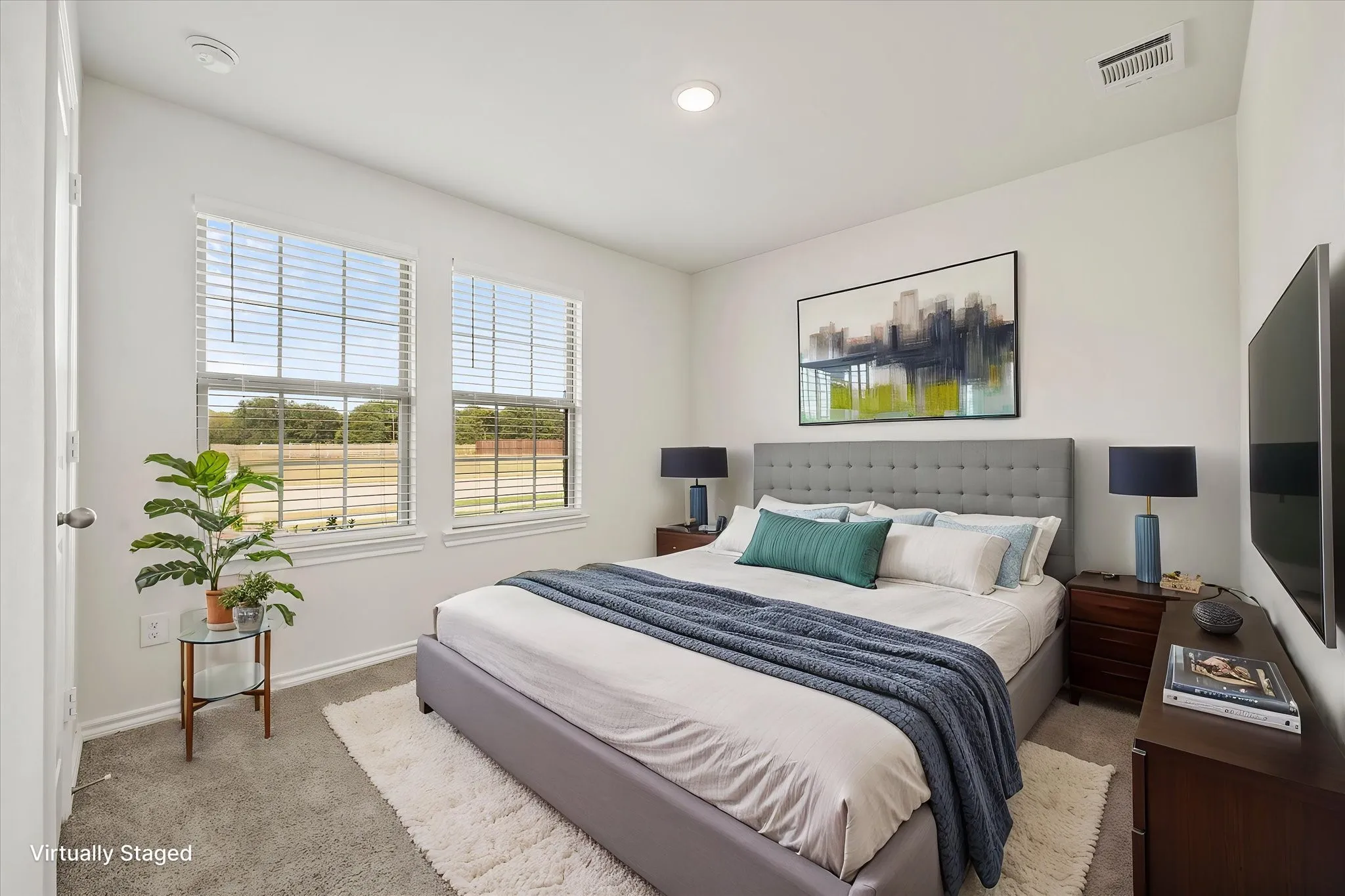 Virtually staged. Lovely master bedroom opens onto master bath