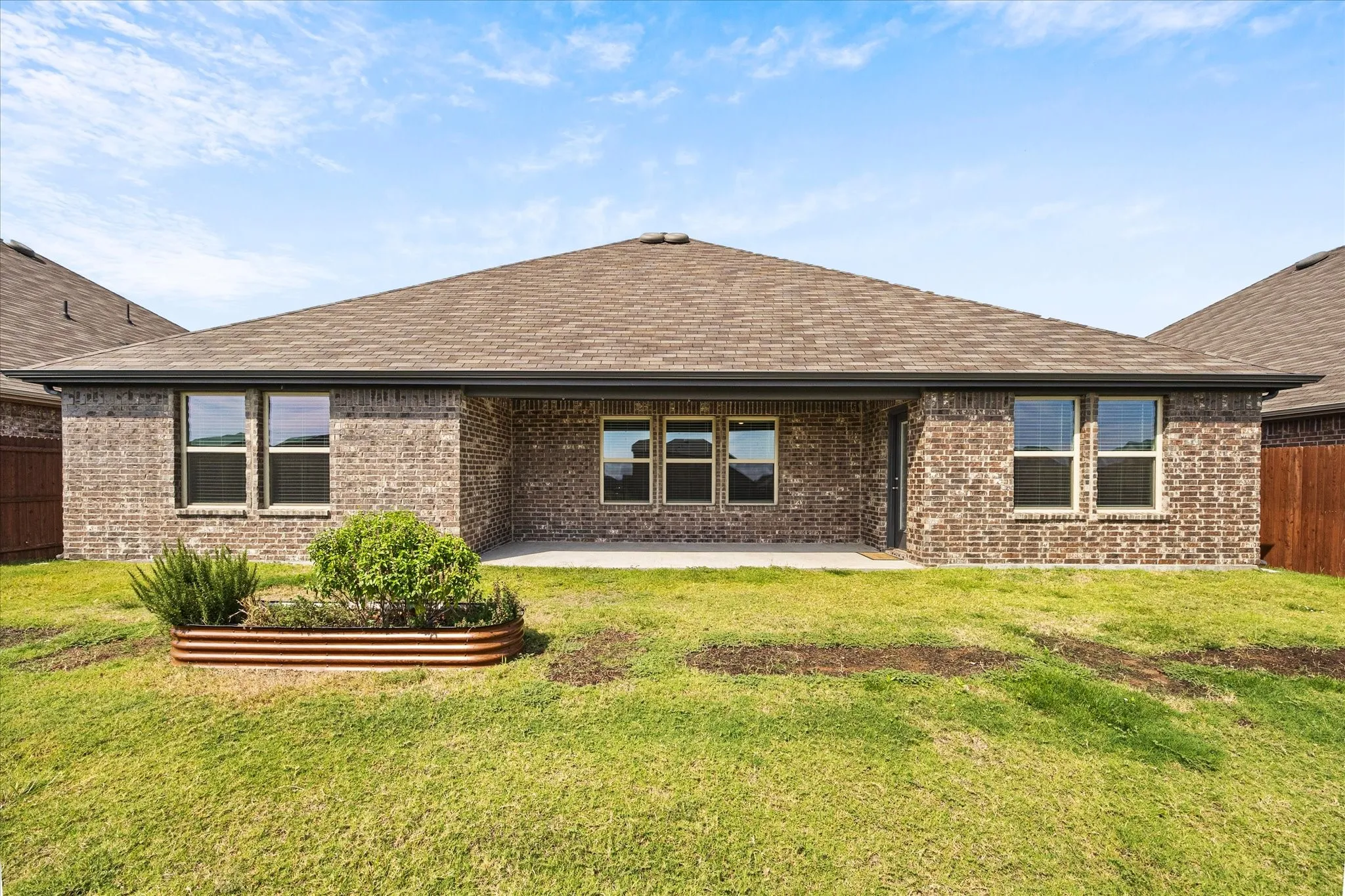 Extended covered patio is great for outdoor entertaining