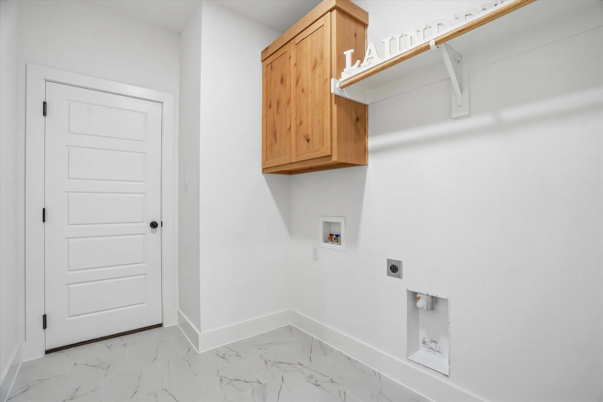 White paneled door with matte black hardware