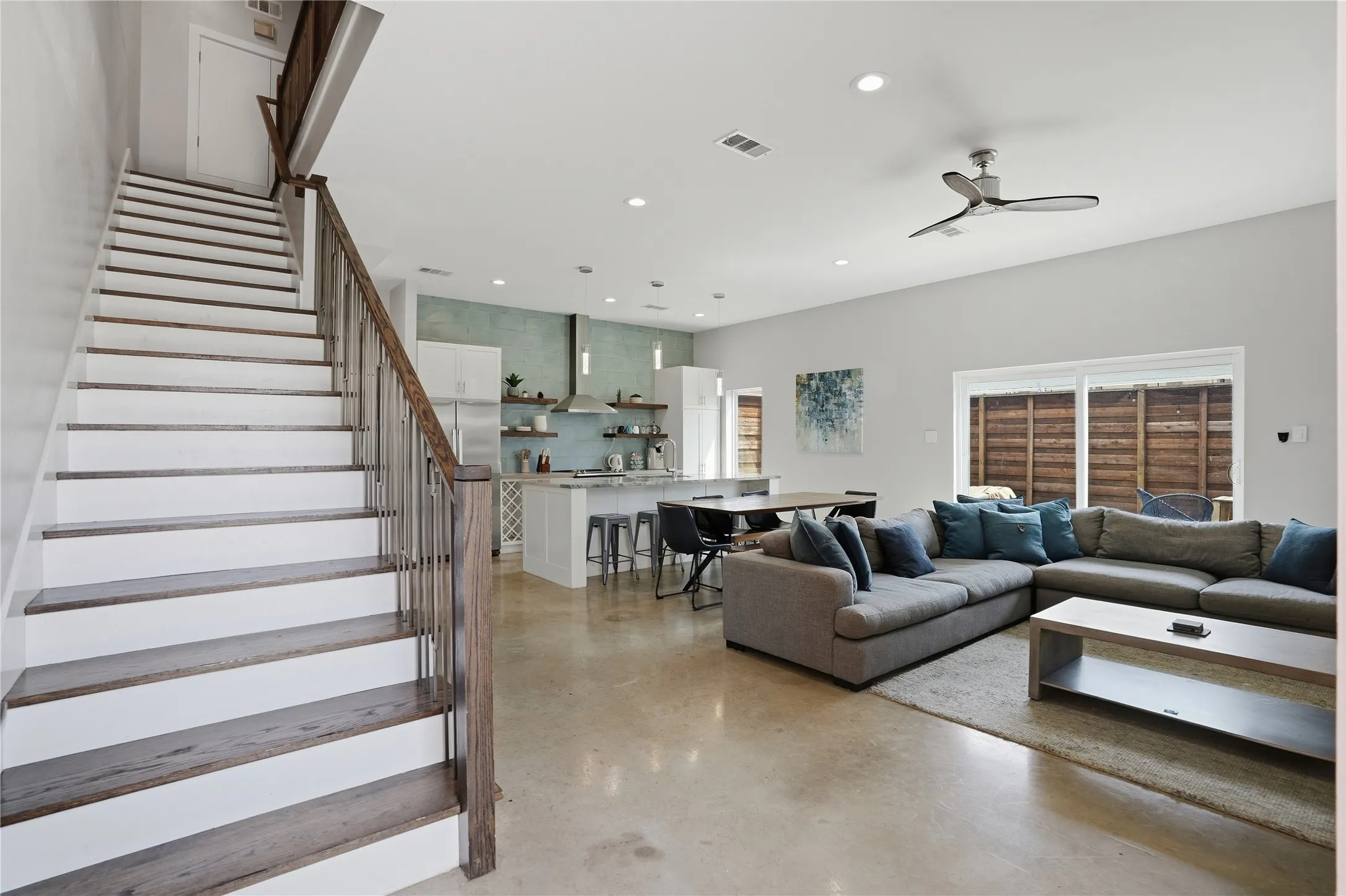 Entry showcasing the large open living room and kitchen