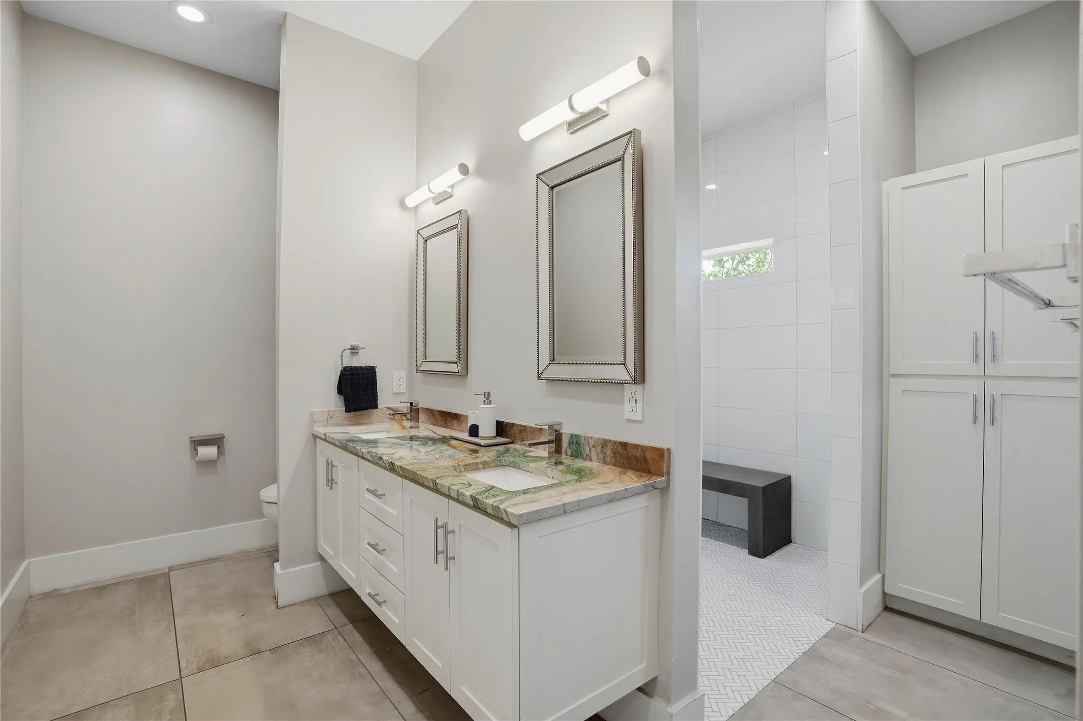 Dual vanity with custom marble countertop