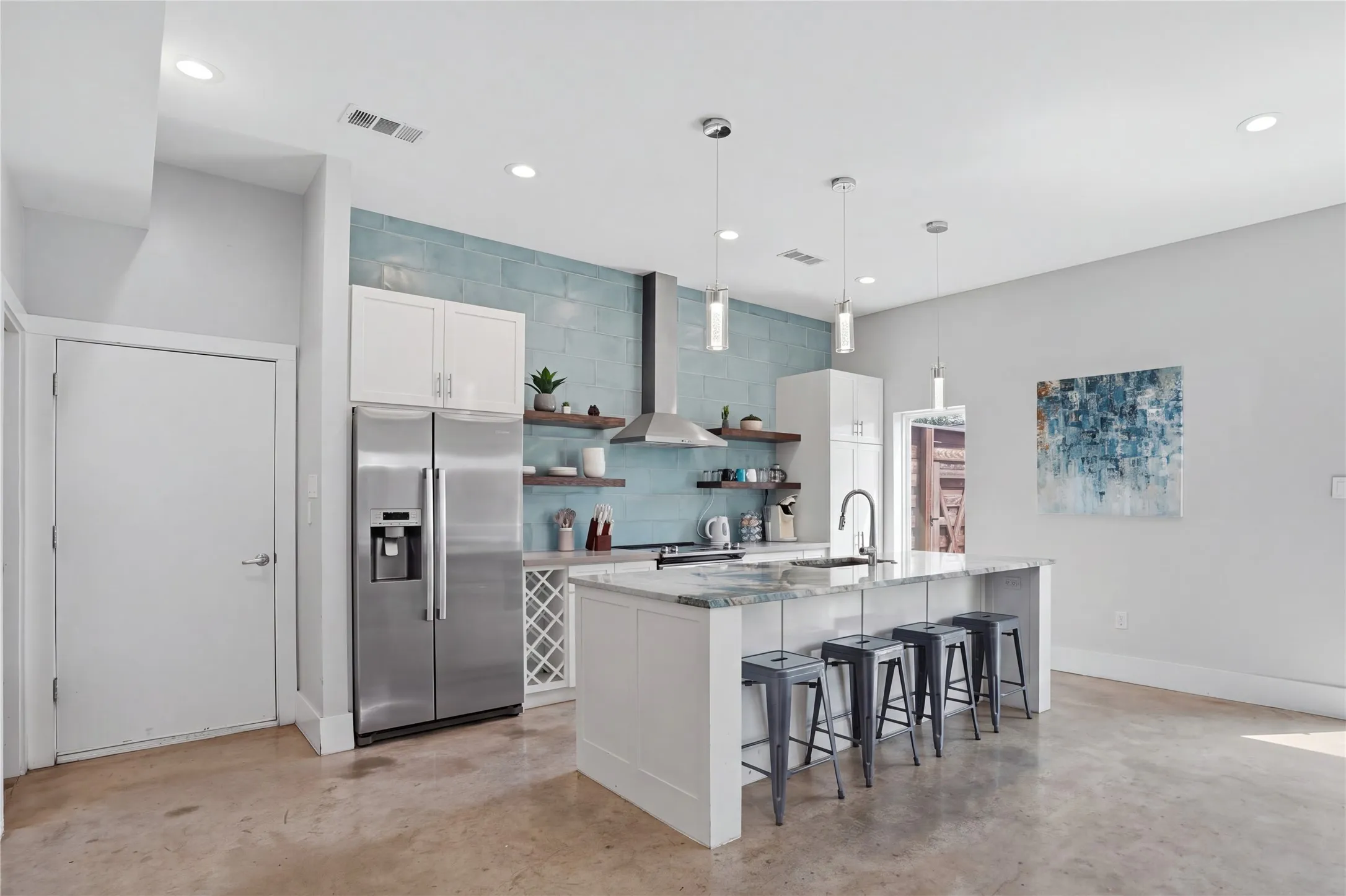 Welcome to 180 S Cisco! Featuring a knocked out kitchen, concrete flooring, and incredible custom stonework throughout