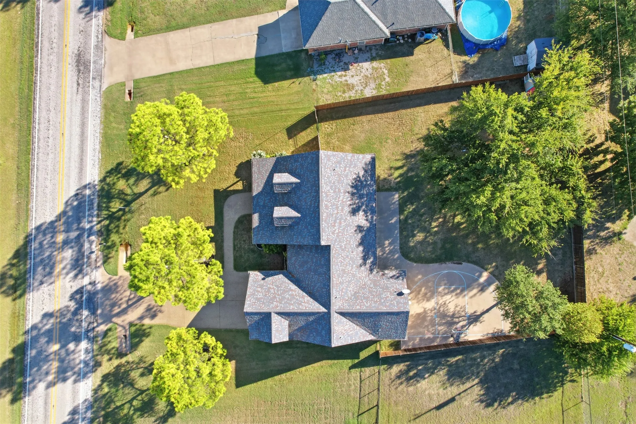 Asphalt shingle roofing with multiple dormer windows