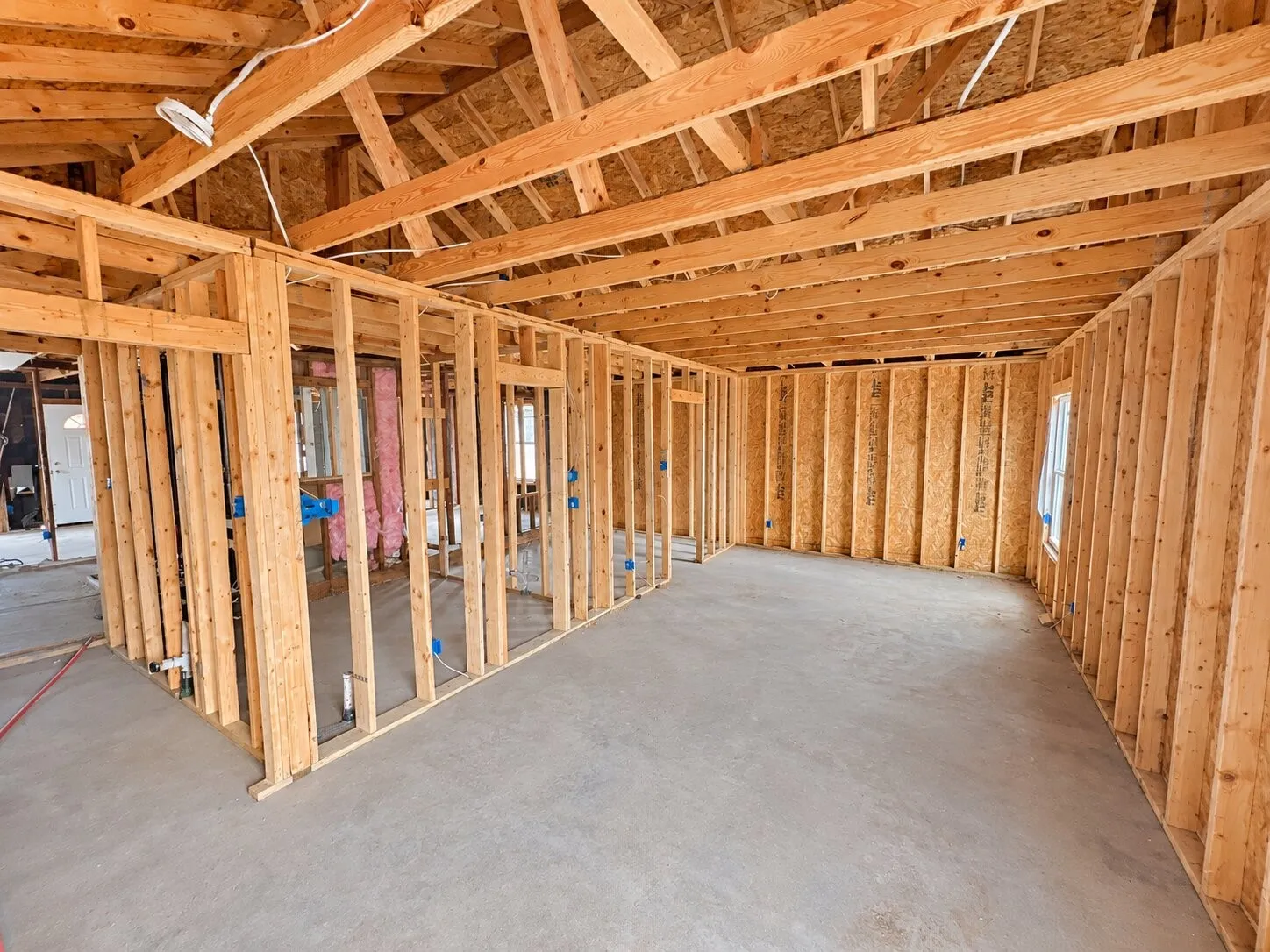 Exposed wood framing with plywood sheathing