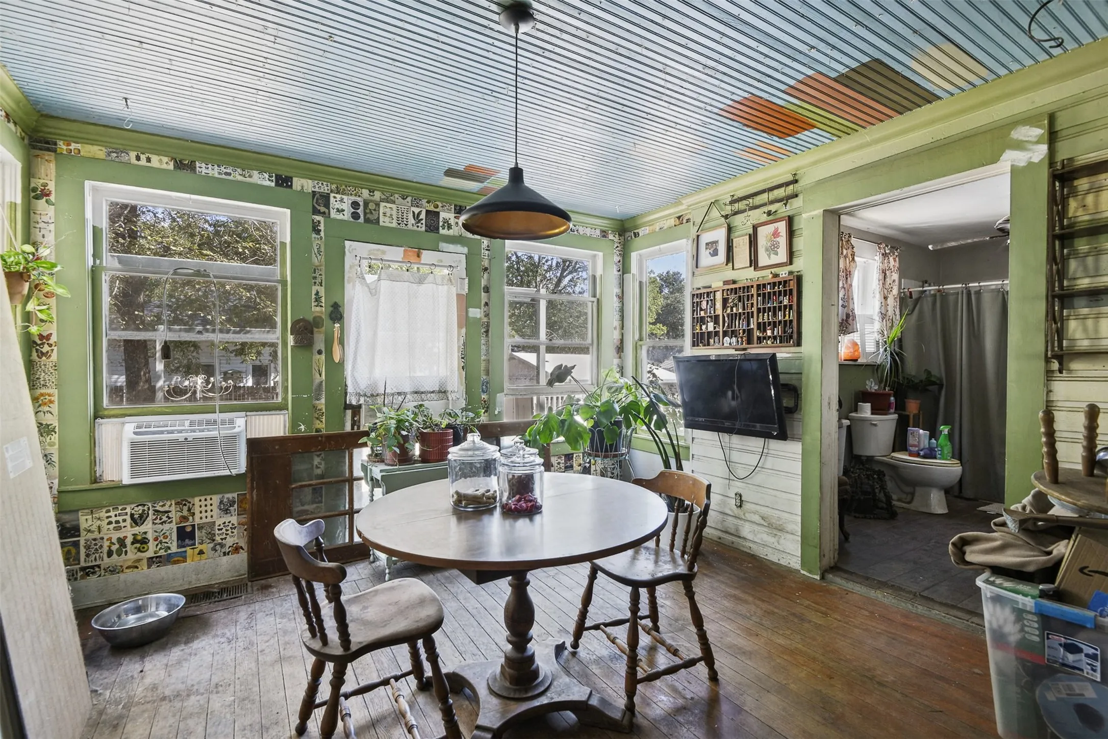 Could also be eat in dining area. Connects to kitchen, bathroom, and bottom of stairs.