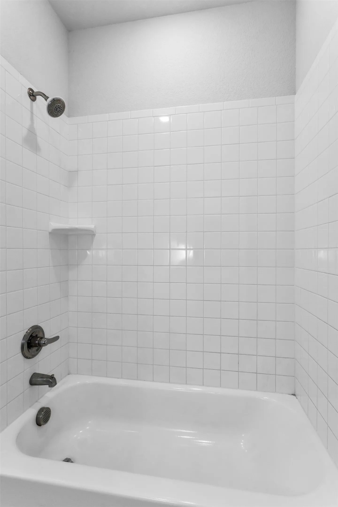 White subway tile surround