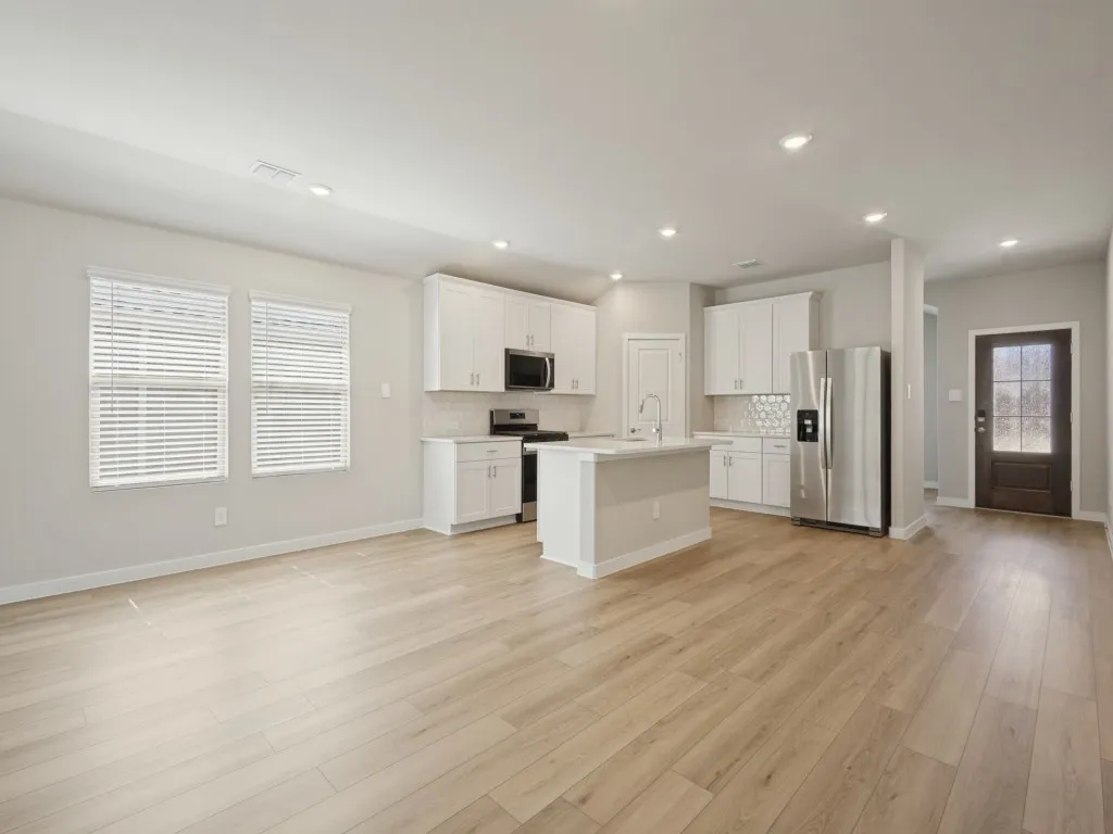 Hallway leading to the kitchen and dining area