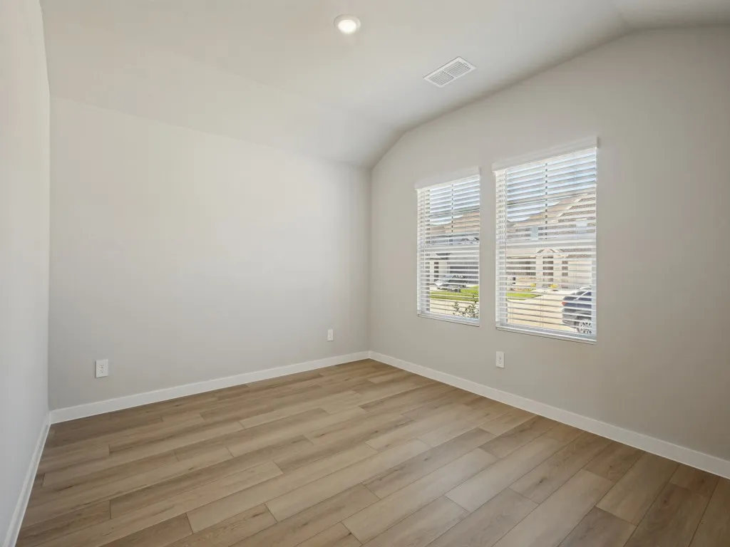 Office to the right as soon as you enter with luxury vinyl plank flooring