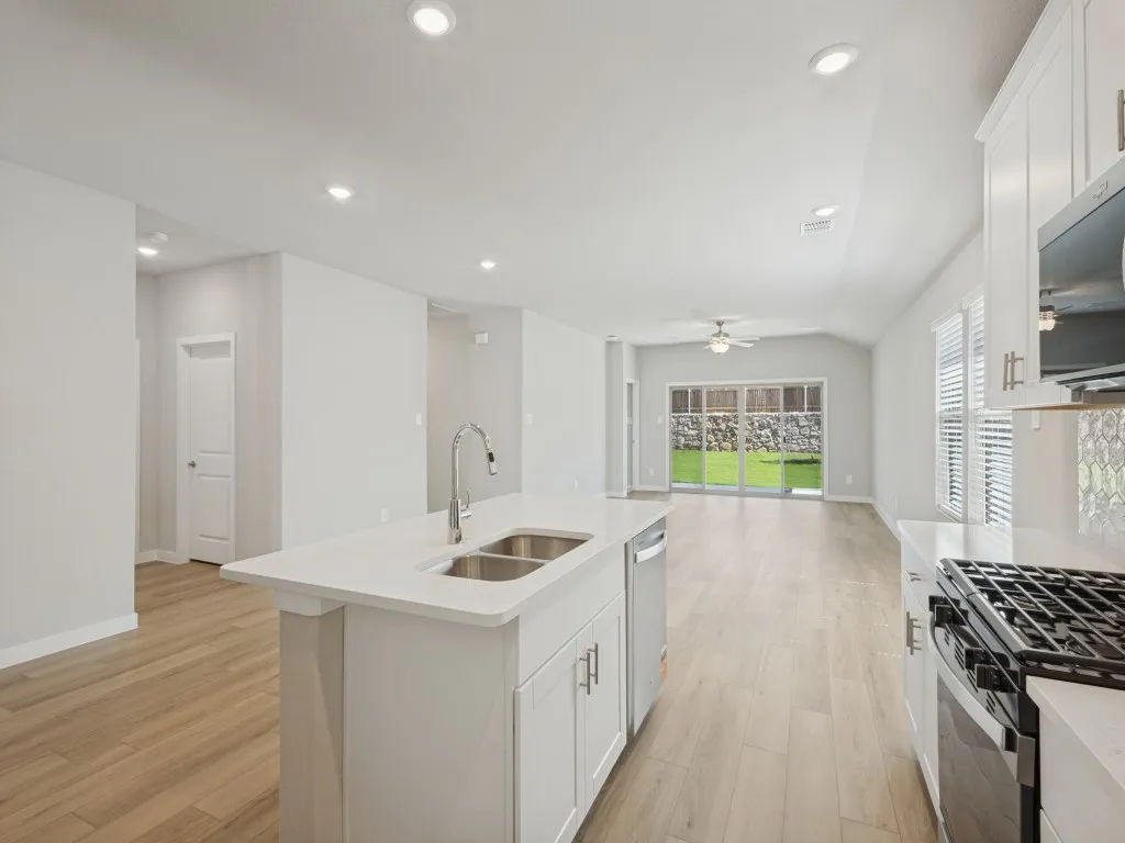 View of the entire kitchen living and dining