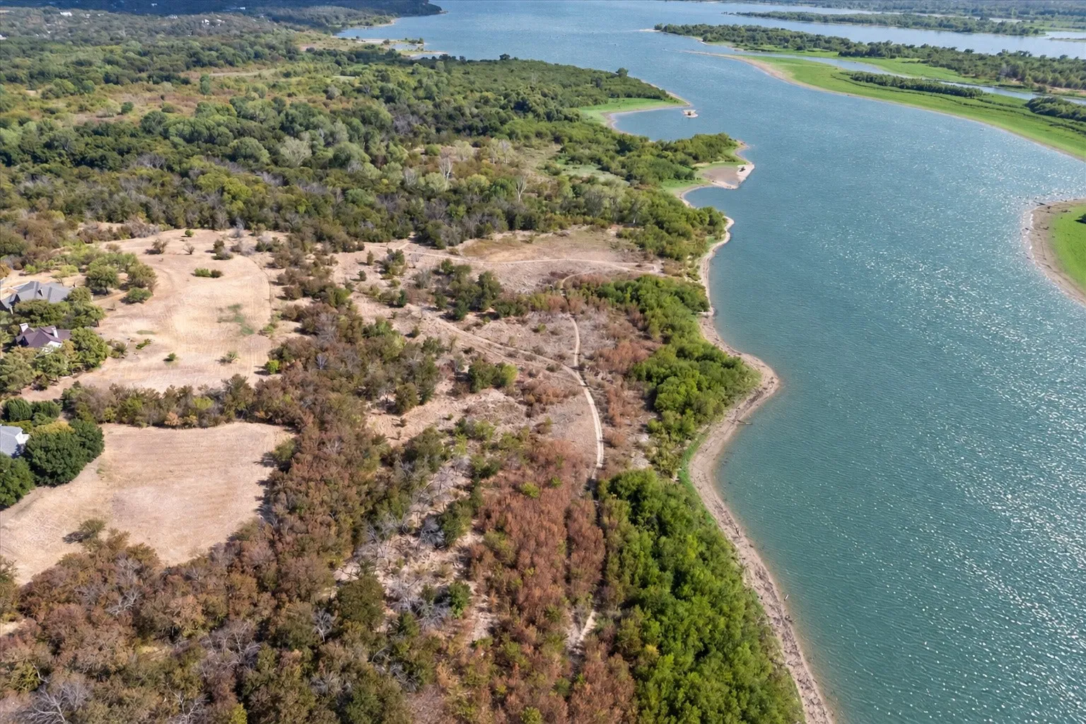 Waterfront property with extensive acreage