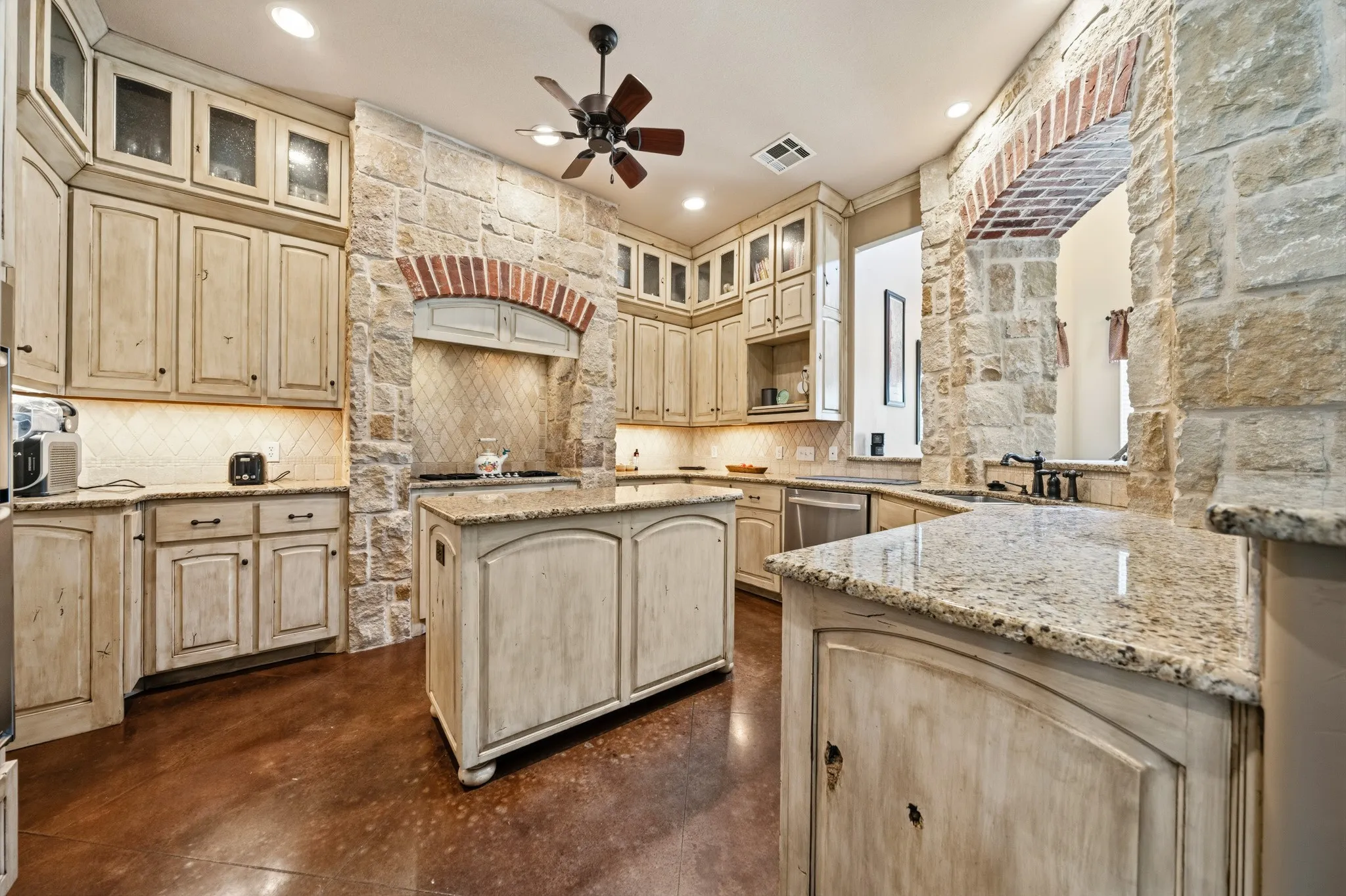 Stone accent walls with brick archways