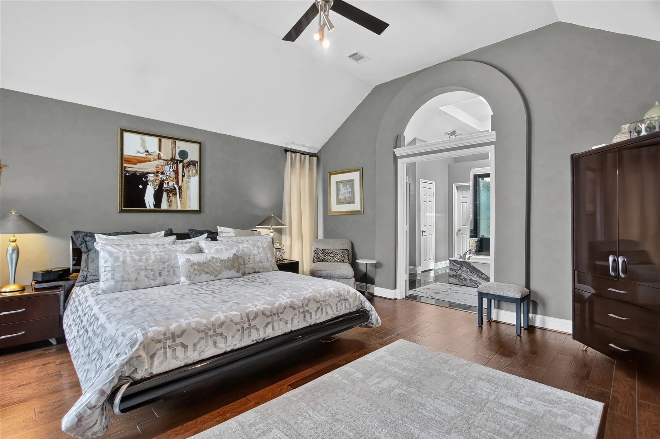 Primary retreat on the first floor is an impressive 17 x 17 and has views of your backyard oasis from the sitting alcove.
2018 All new wood floors installed