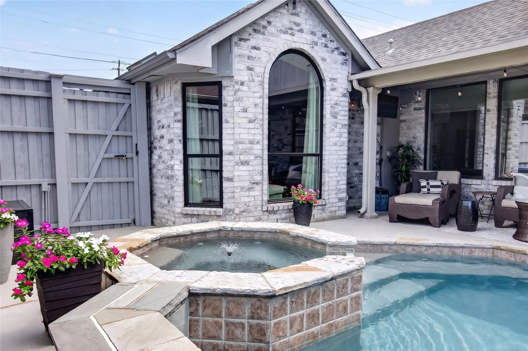 View of Spa steps away from covered patio  2021 New Pool Heater added, 2022 New Pool Pump
Just waiting for you to make a Splash