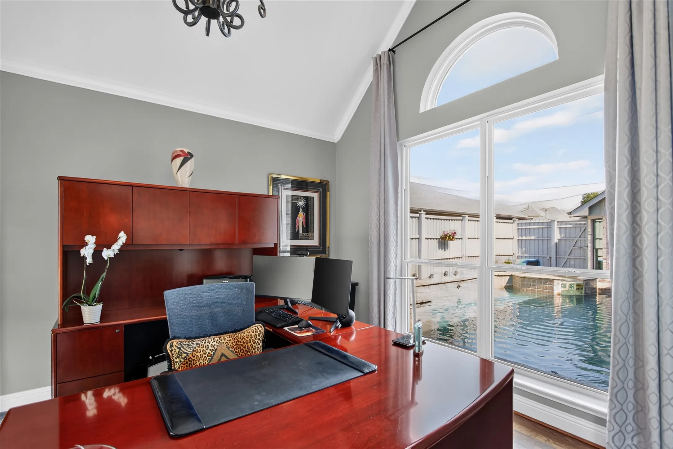 Front office with vaulted ceiling has views of your private backyard oasis. No need for a home office? this Flex room would be great as a reading room, exercise room or childrens play room as the wood barn doors can be closed off when entertaining.