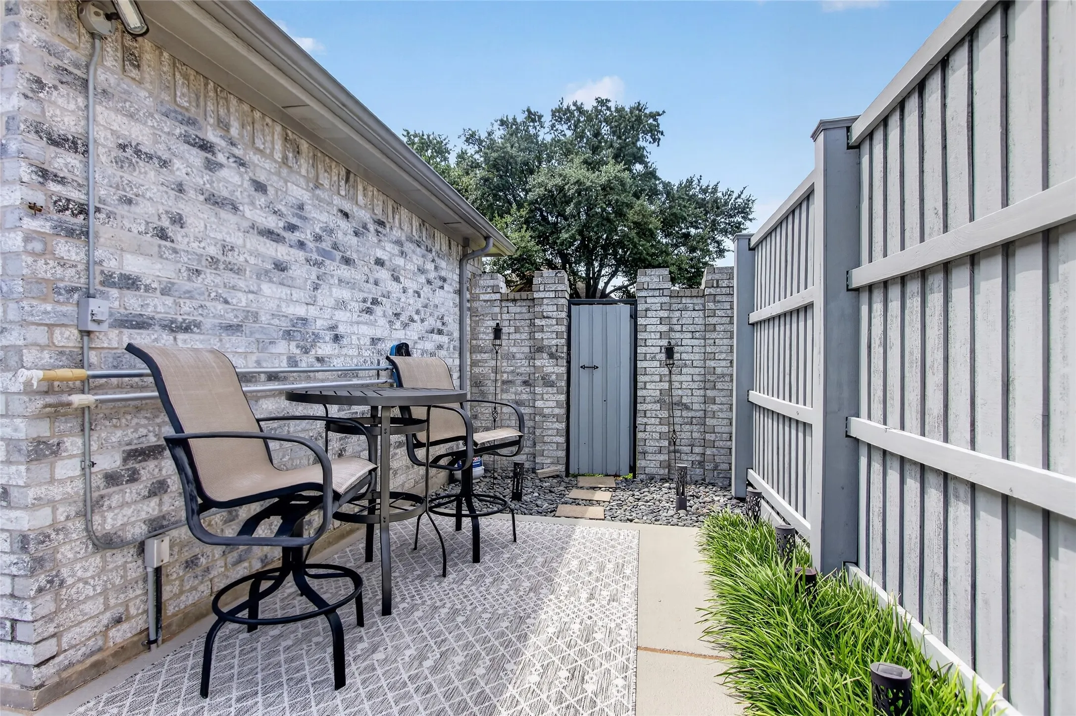 2026 New downstair AC.  Wide side yard with direct access to the front of the house. Great area to store additional patio furniture, pool floats, etc. 2022 5 Ton Lennox Condenser installed and OEM Fan Motor/capacitor added for downstairs
