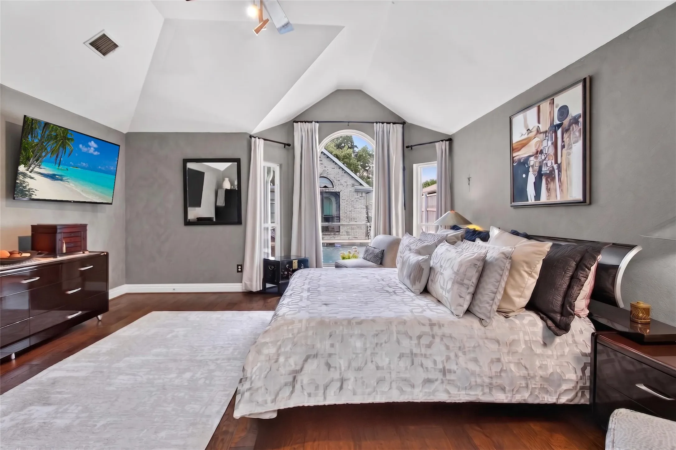 Primary retreat on the first floor is an impressive 17 x 17 and has views of your backyard oasis from the sitting alcove.
2018 All new wood floors installed