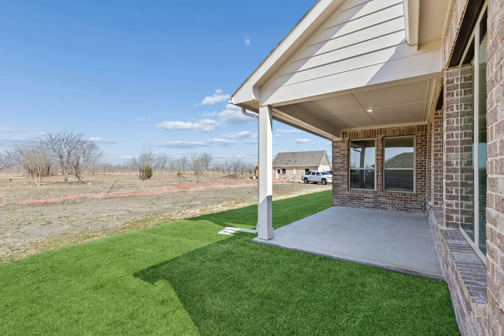 Covered patio with a concrete surface