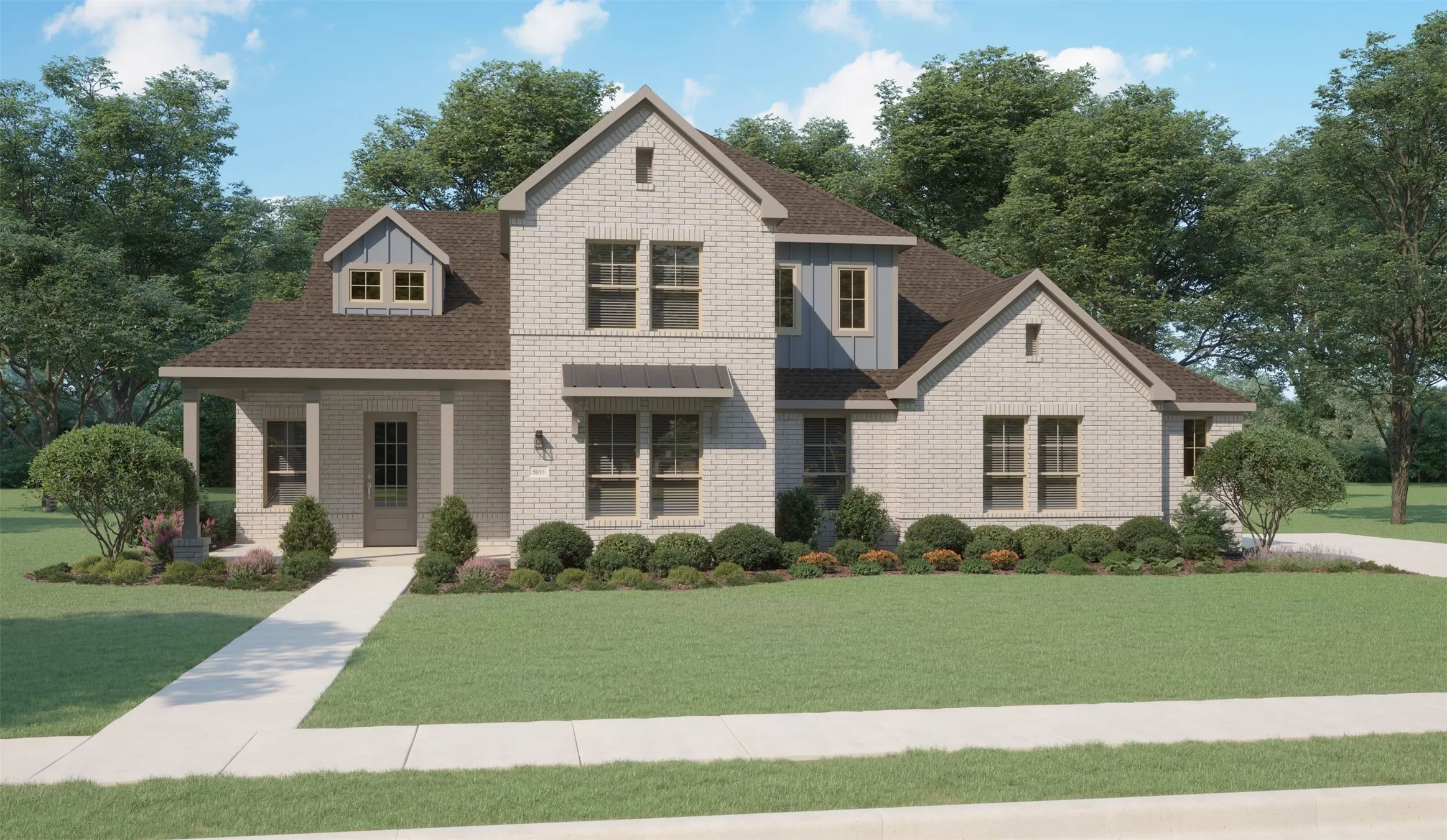 Brick exterior with varied gables, covered porch entry, dormer windows, and a manicured lawn