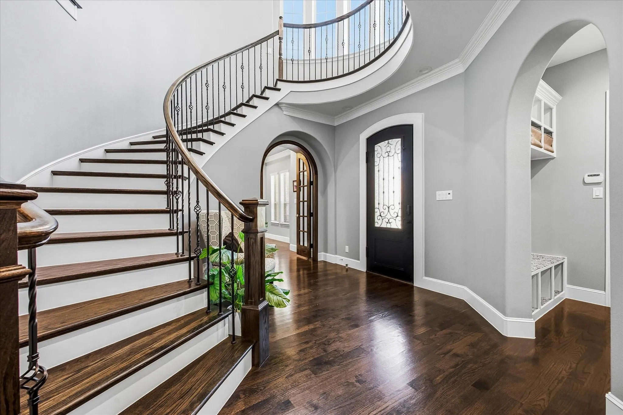Sweeping wood staircase