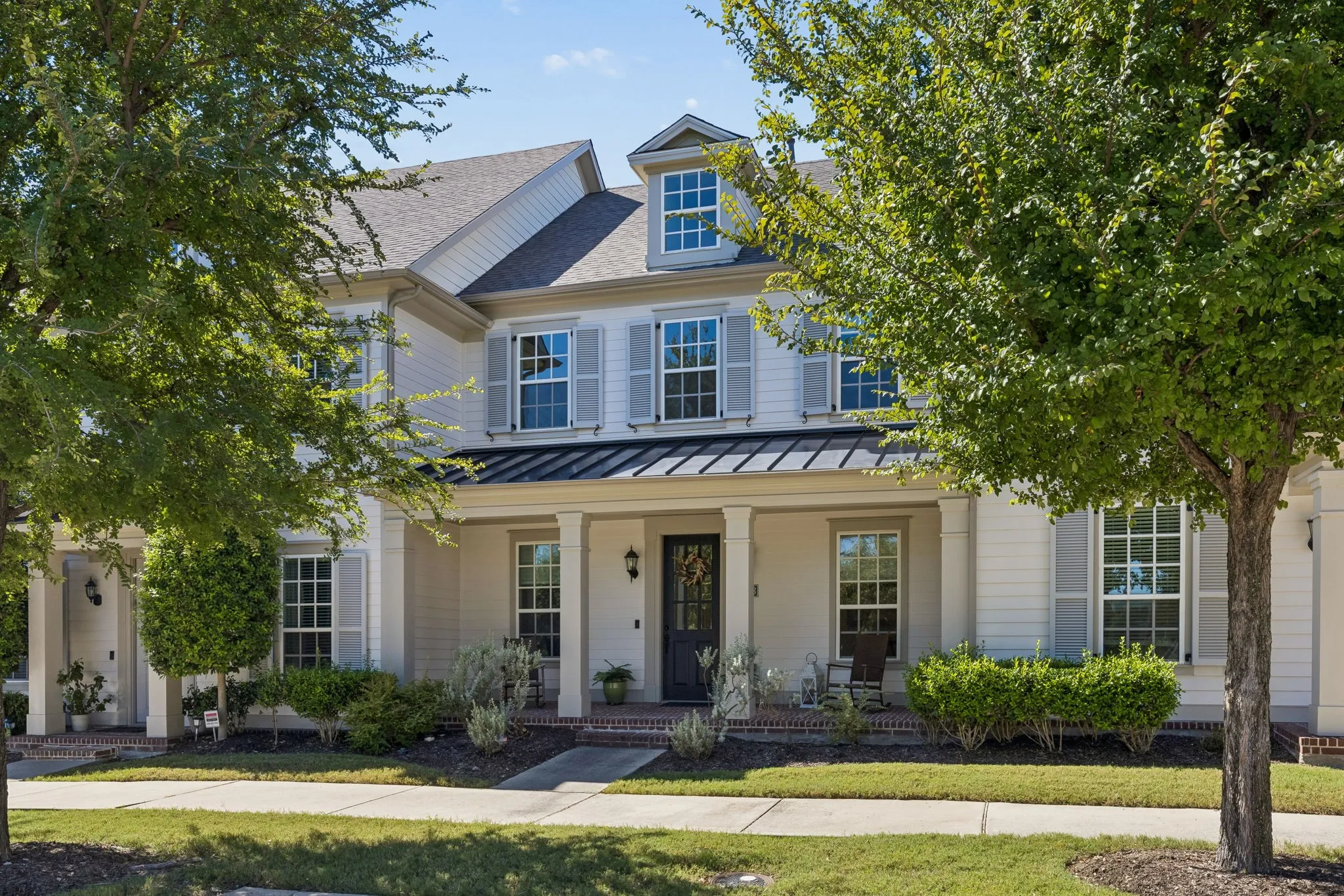 Stately front porch on this beautiful home