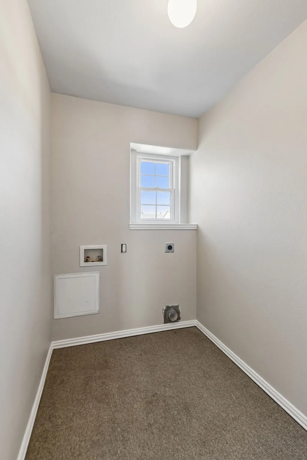 Laundry room located upstairs