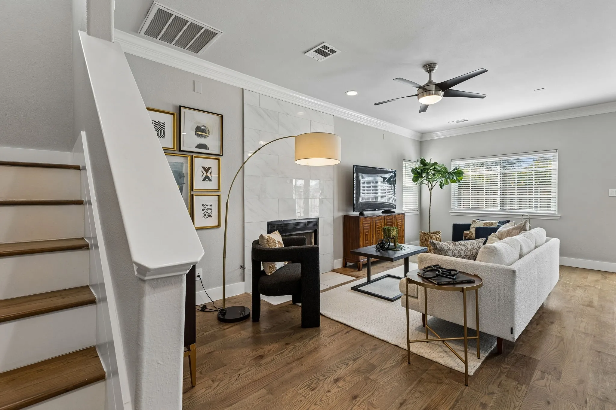 Hardwood flooring, recessed lighting, crown molding