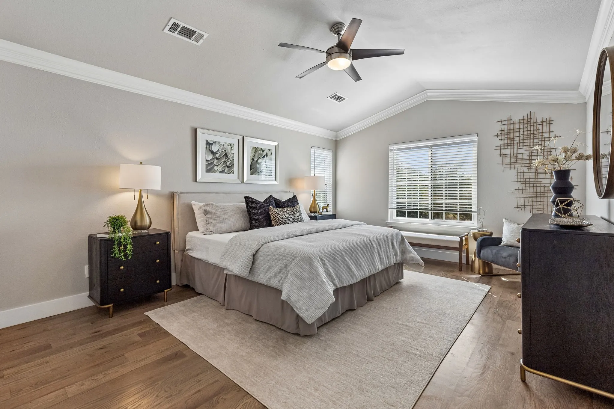 Spacious primary bedroom with custom closet
