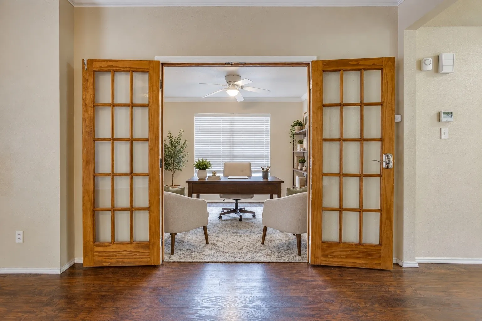 French doors with wood-finish frames - virtually staged with AI