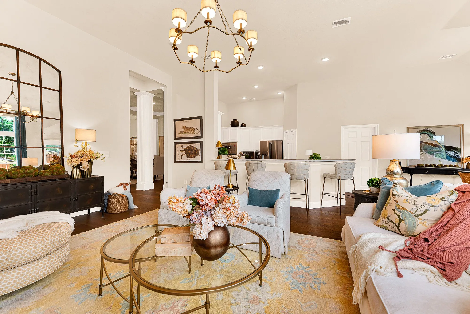 An airy, open layout links living and dining zones under soaring heights for seamless interior movement. Savor peaceful morning coffee while early light fills the open living space.