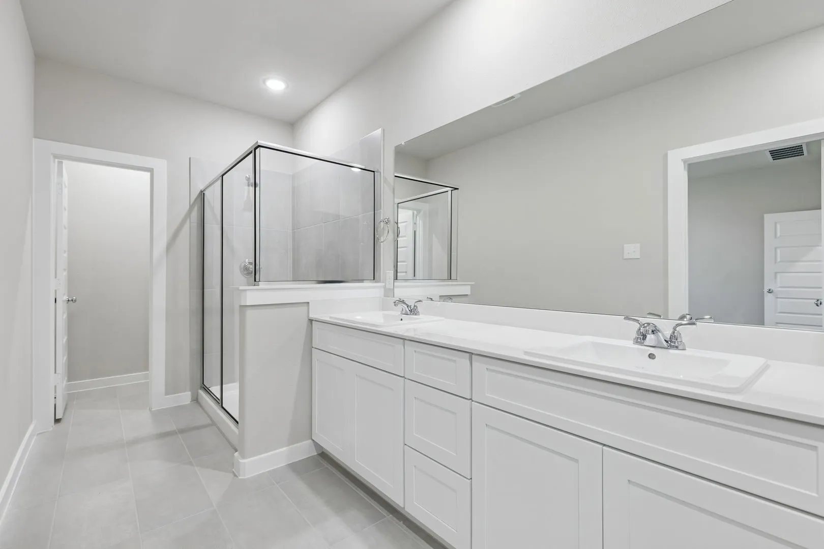 Primary Bathroom in the Holden home plan – REPRESENTATIVE PHOTO