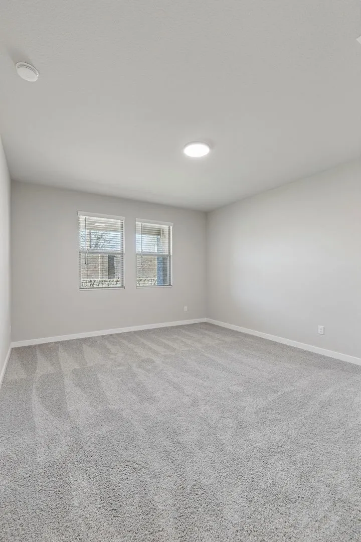 Primary Suite in the Holden home plan – REPRESENTATIVE PHOTO