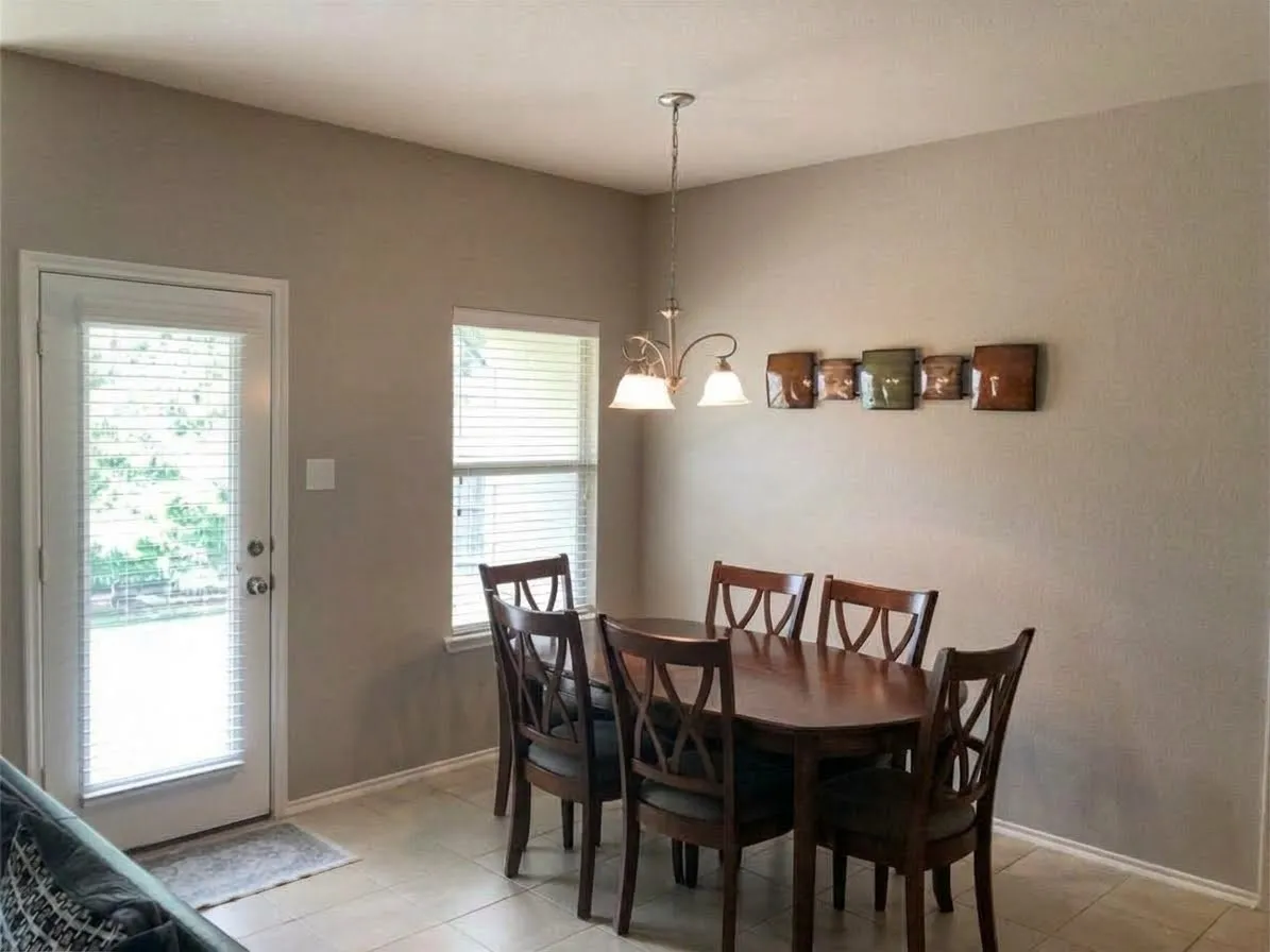 Dining area overlooking backyard.