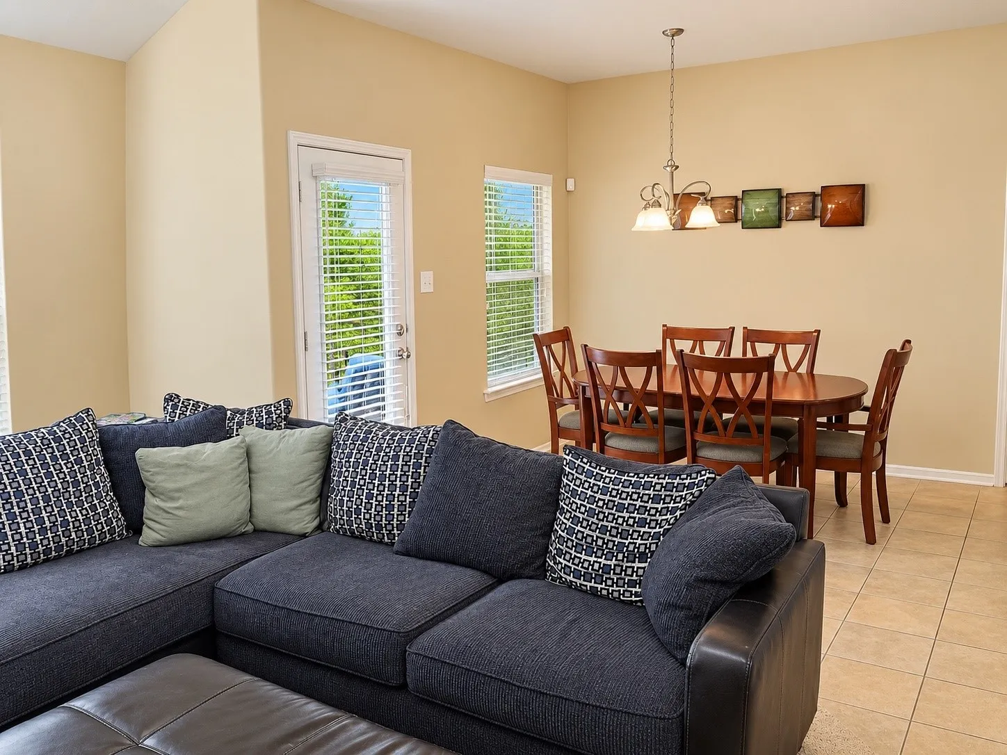 Living space adjacent to dinining area.