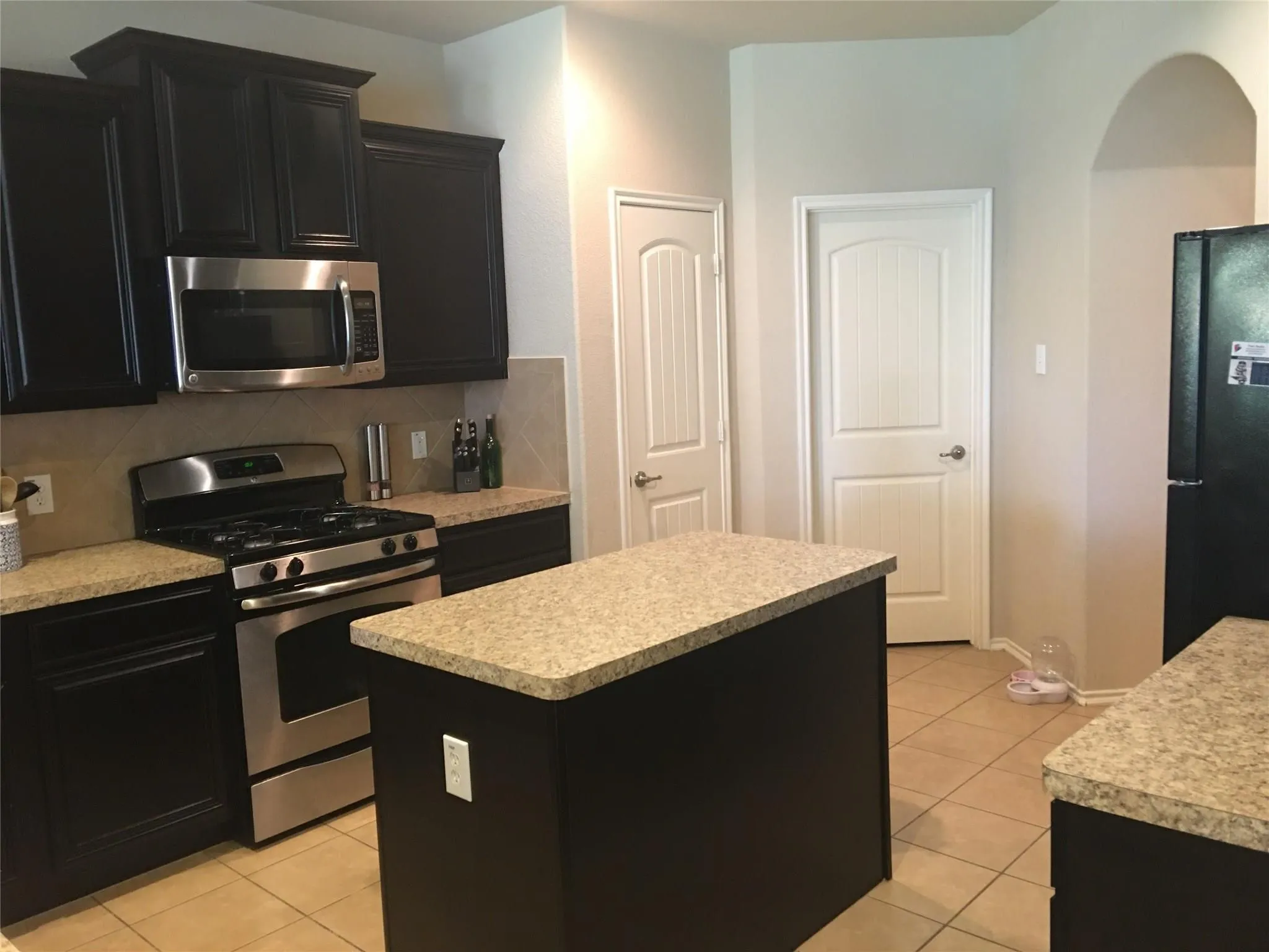 Kitchen complete with island.