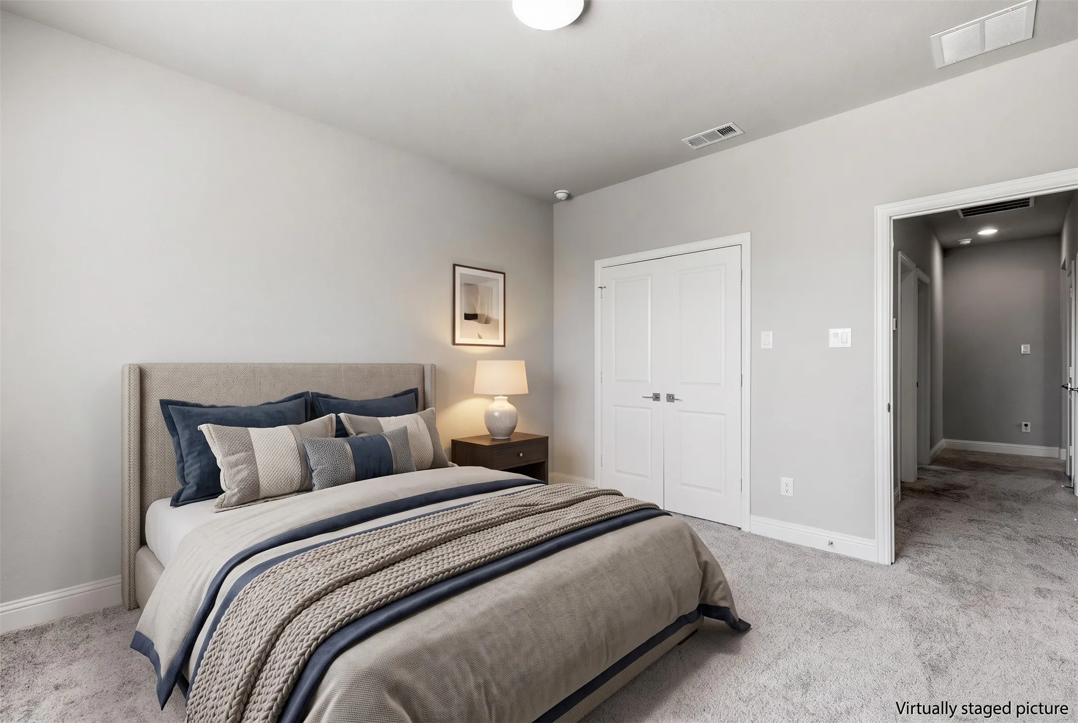 Neutral wall palette, soft carpeting, recessed lighting, and white paneled doors