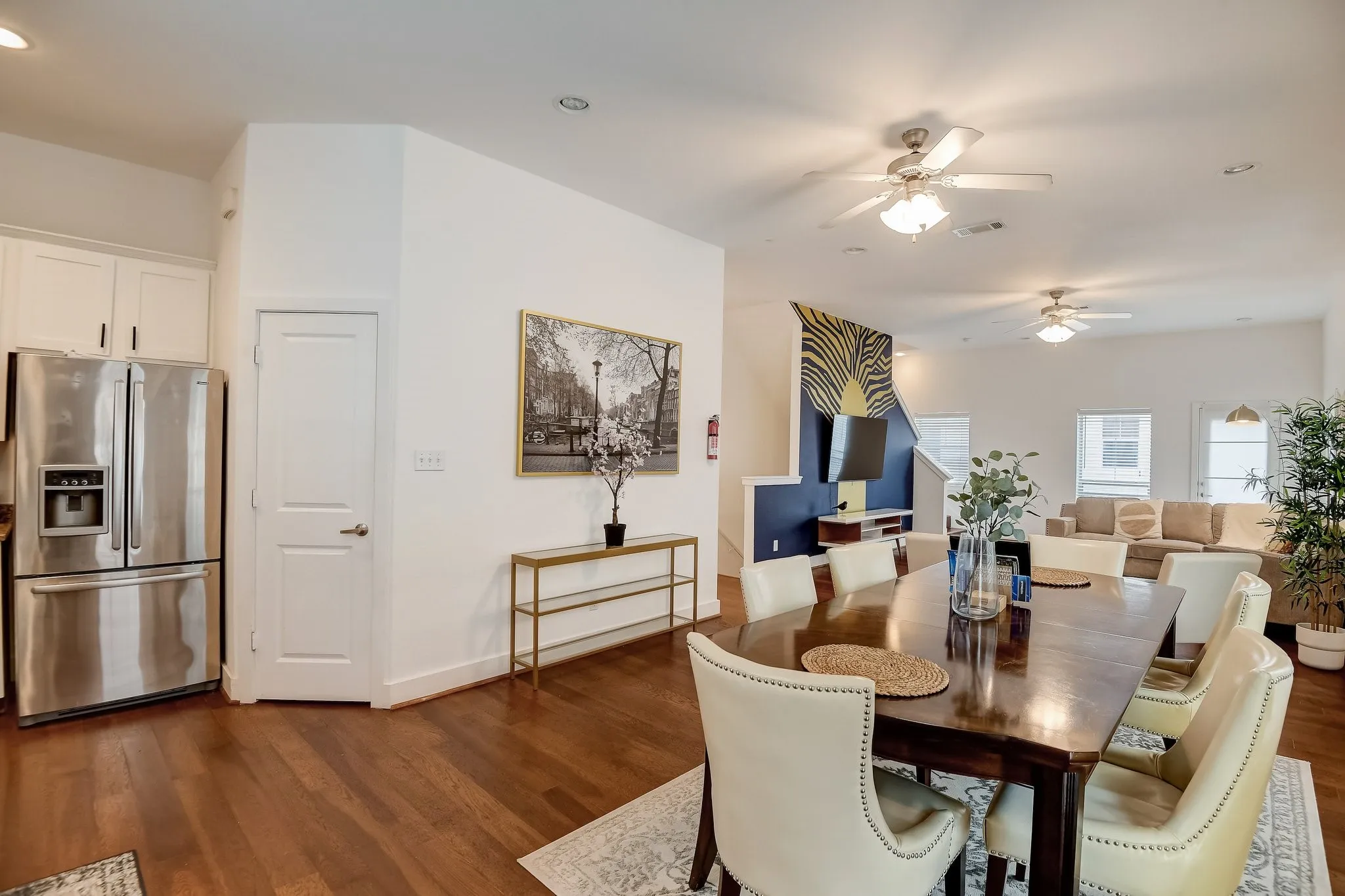Dining space with a ceiling fan, dark wood-style flooring, recessed lighting, and baseboards