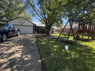 Attached garage with white door