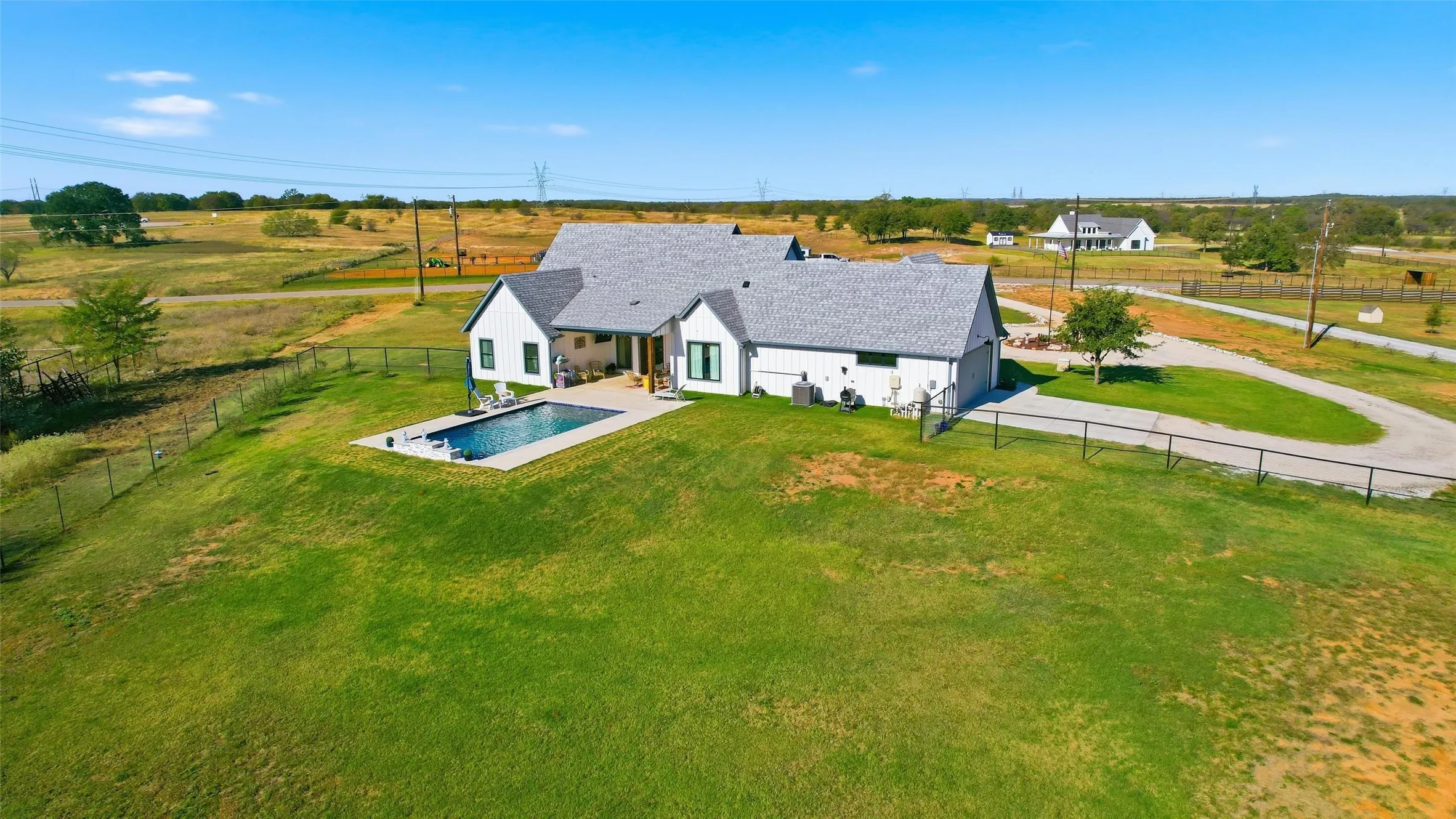 Overview of rural landscape featuring a pool area