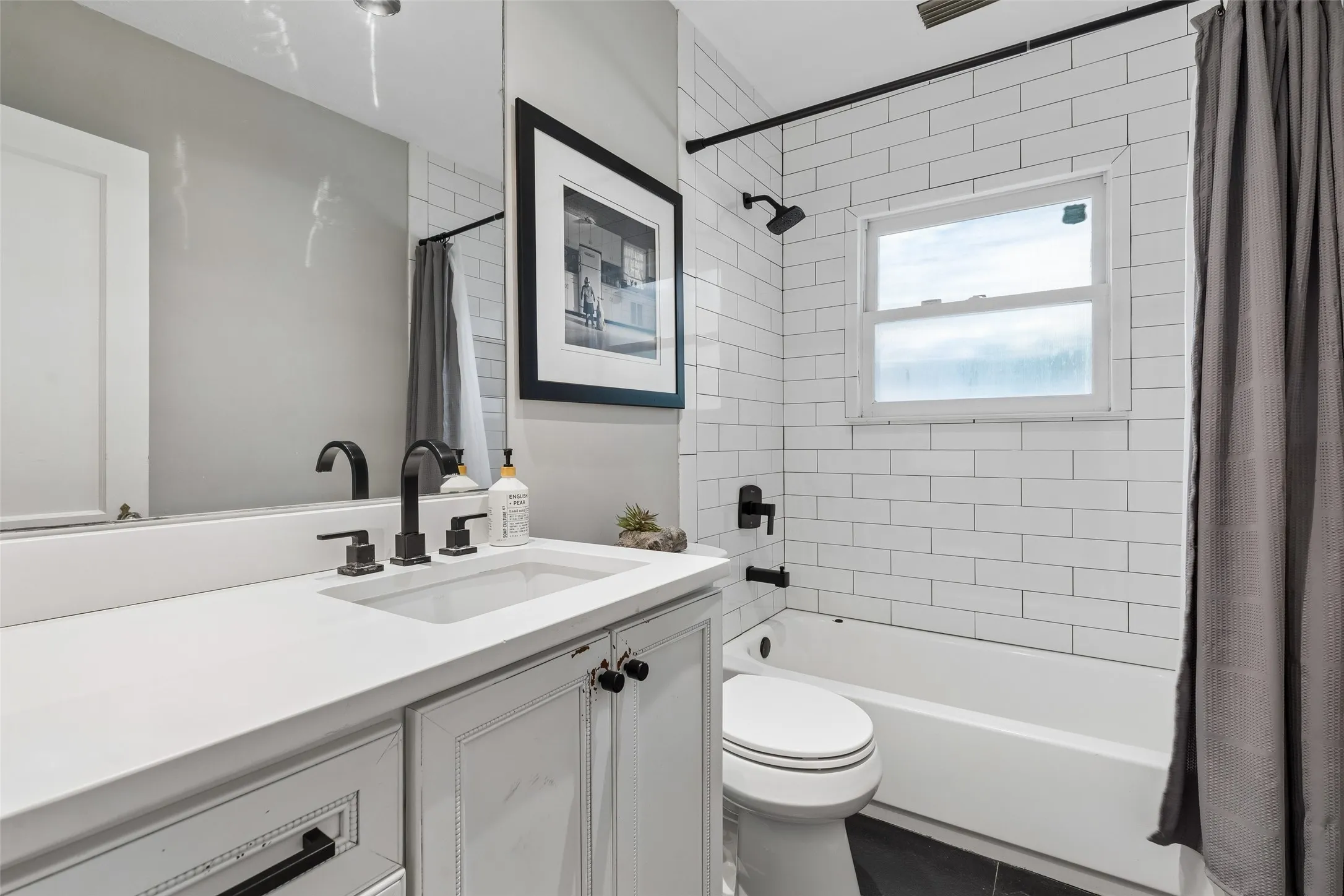 White subway tile shower surround