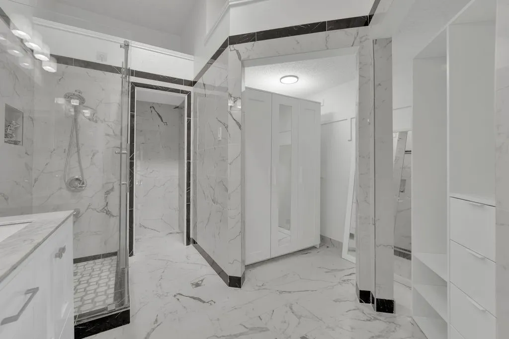 Marble-look tile flooring and accent trim