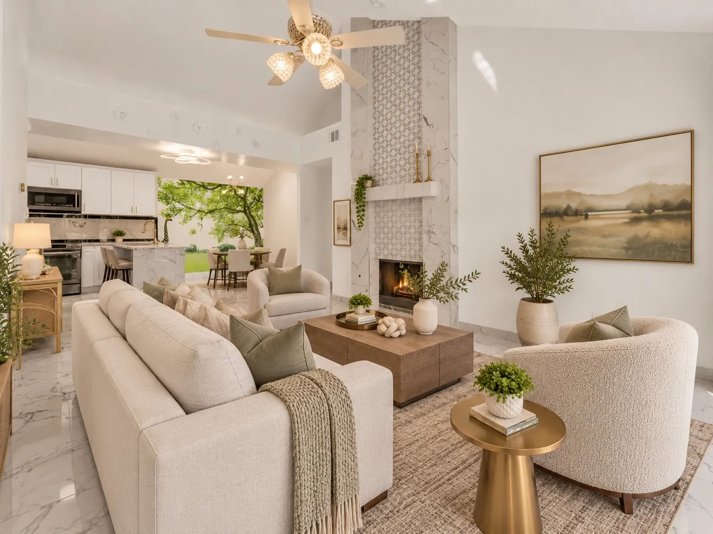 Open-concept living space with vaulted ceiling and a ceiling fan
